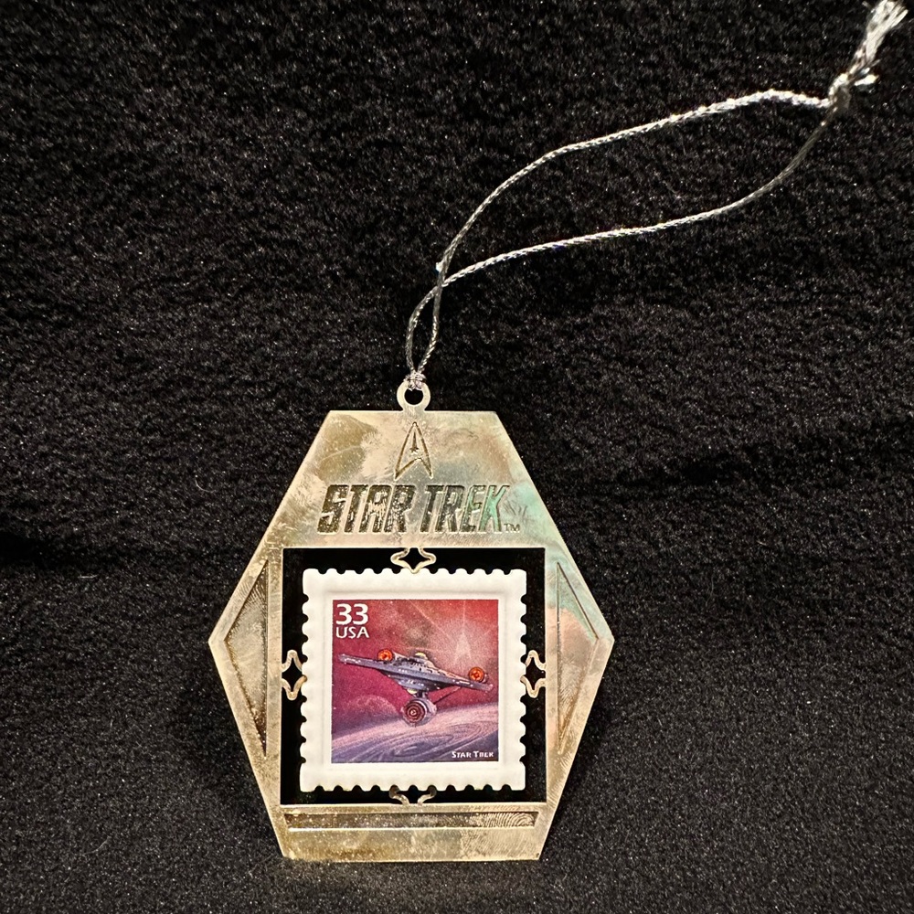 This Hallmark StarTrek USS Enterprise NCC -1701 Stamp Ornament - Picture 2 of 4